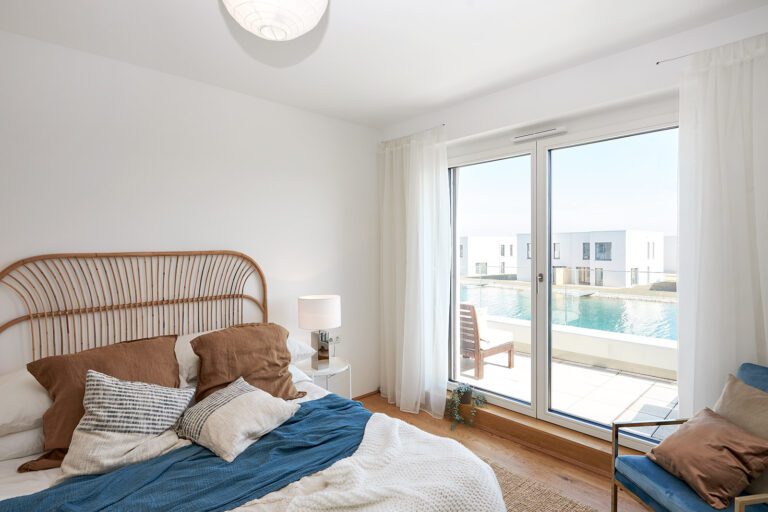 Reihenhaus Abendglanz am See: Ihr charmantes Zuhause am Sonnenweiher in Grafenwörth, Niederösterreich, nahe Wien – ein idyllischer Ort, um die Abendsonne und das Leben am Wasser zu genießen.